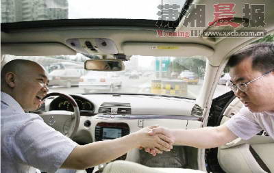 北京一车主13年顺风车免费搭载万人